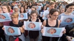 Supporters of Homa Hoodfar hold a demonstration calling for her release Wednesday, September 21, 2016 in Montreal. Hoodfar, a Canadian-Iranian academic has been held in Iran's Evin prison for more than 100 days. (THE CANADIAN PRESS/Ryan Remiorz)