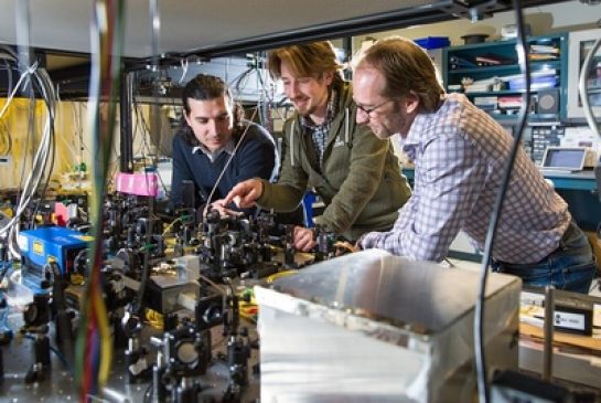Wolfgang Tittel, right, led the team that used city fibre optic lines to do groundbreaking experiments on photons.