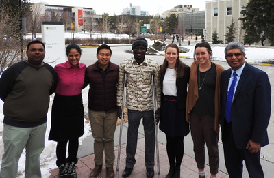 Vice-Provost (International) Janaka Ruwanpura, far right, with a group of QES scholars, from left: Asiri Senasinghe, Zeeyaan Somani, Kevin Capuno, David Achuro, Amy Bruce, and Sydney Krill.